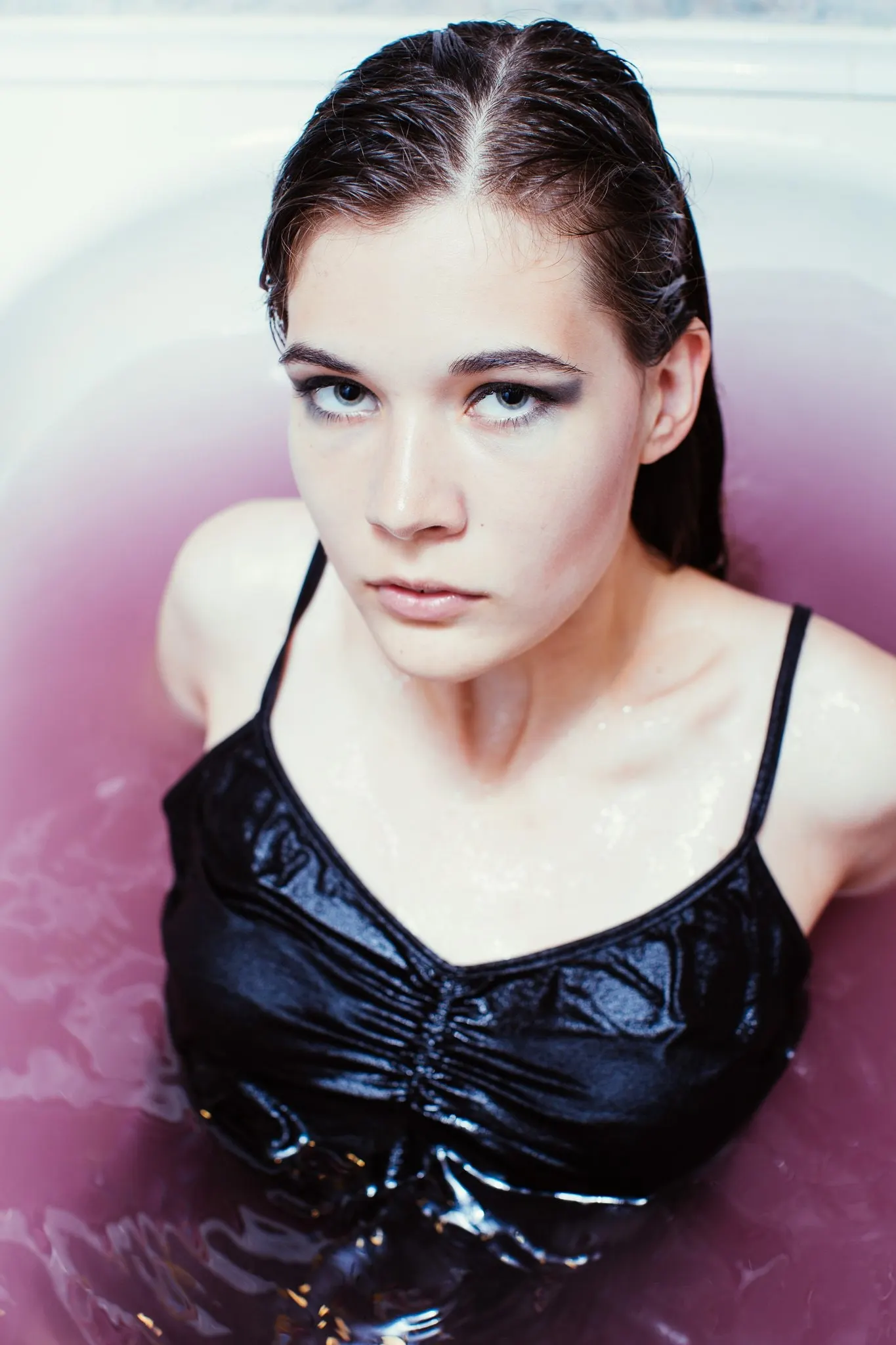 Portrait of Nana in a black top in water